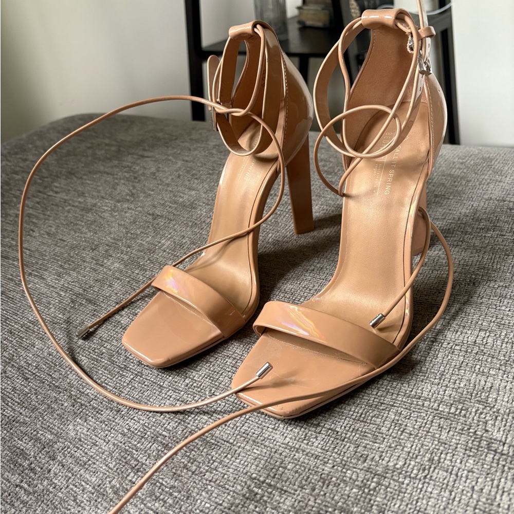Nude patent heels